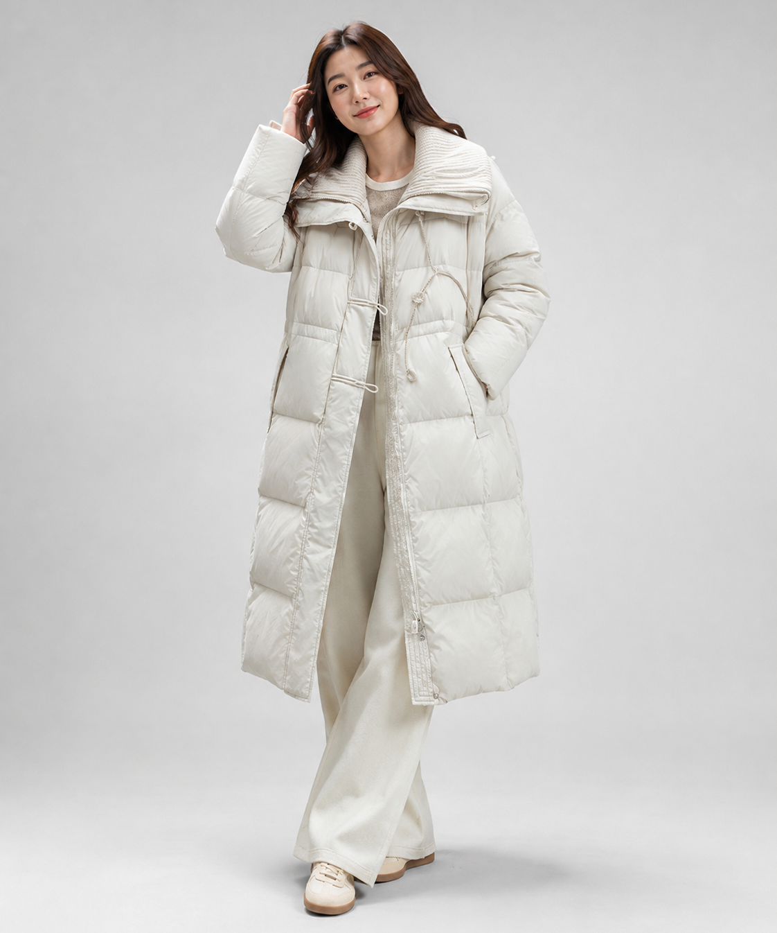 Doudoune grande taille femme – col large, coupe longue, détail patchwork