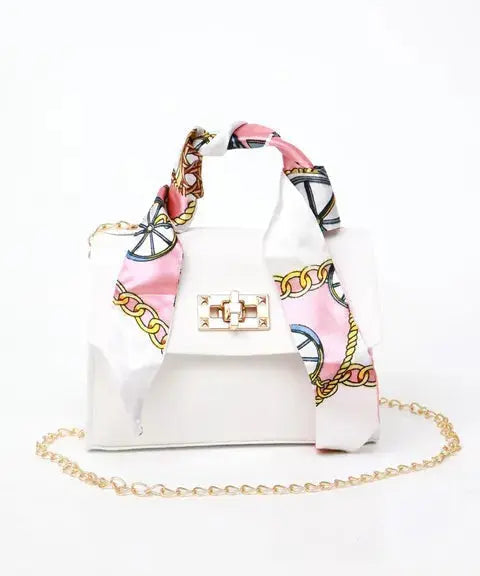 Sac à main élégant en cuir brun avec détail foulard