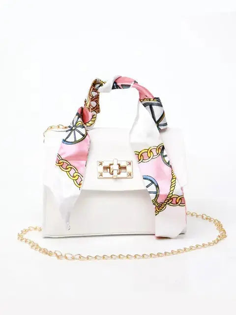 Sac à main élégant en cuir brun avec détail foulard