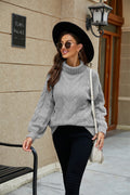 Pull femme à col roulé en tricot torsadé élégant