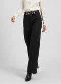 Pantalon ajusté effet métallique élégant